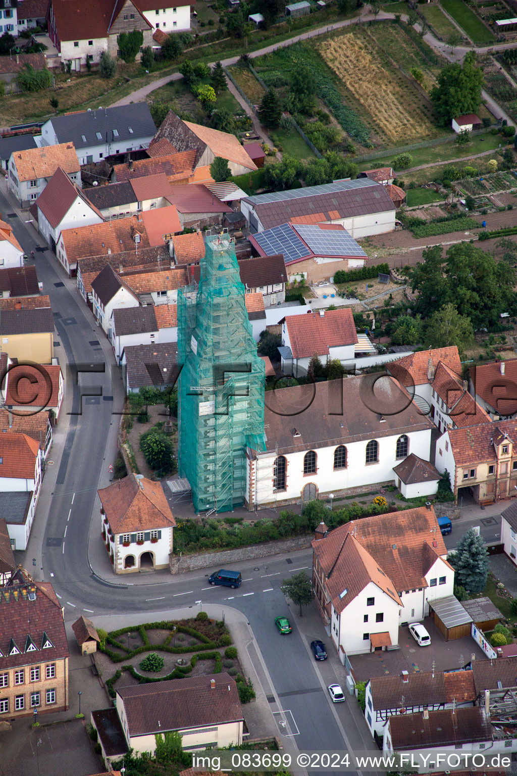 Catholic church scaffolded by Leidner GmbH Gerüstbau, Landau in the district Ottersheim in Ottersheim bei Landau in the state Rhineland-Palatinate, Germany seen from above