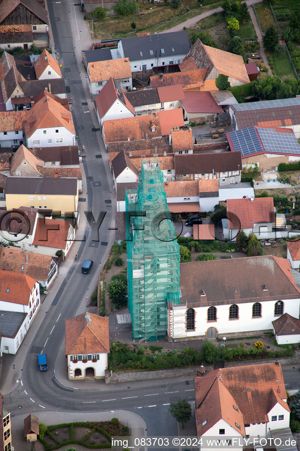 Catholic church scaffolded by Leidner GmbH Gerüstbau, Landau in the district Ottersheim in Ottersheim bei Landau in the state Rhineland-Palatinate, Germany from the plane