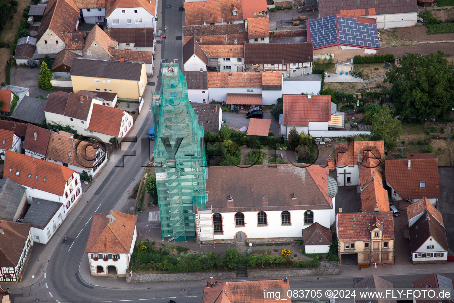 Catholic church scaffolded by Leidner GmbH Gerüstbau, Landau in the district Ottersheim in Ottersheim bei Landau in the state Rhineland-Palatinate, Germany viewn from the air