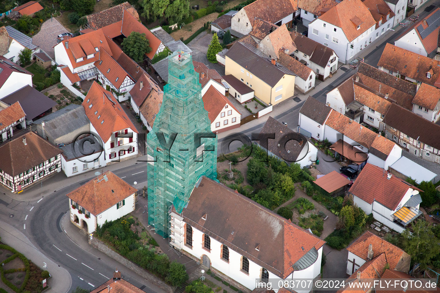 Drone recording of Catholic church scaffolded by Leidner GmbH Gerüstbau, Landau in the district Ottersheim in Ottersheim bei Landau in the state Rhineland-Palatinate, Germany