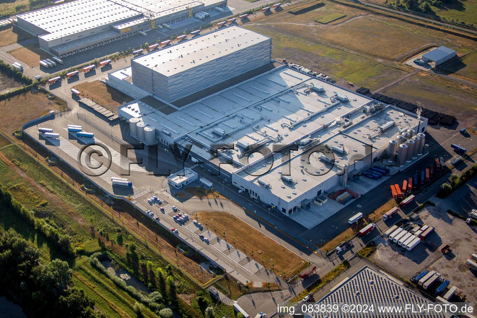 Aerial view of Building of the MEG Getraenke GmbH industrial area Oberwiesen in Woerth am Rhein in the state Rhineland-Palatinate