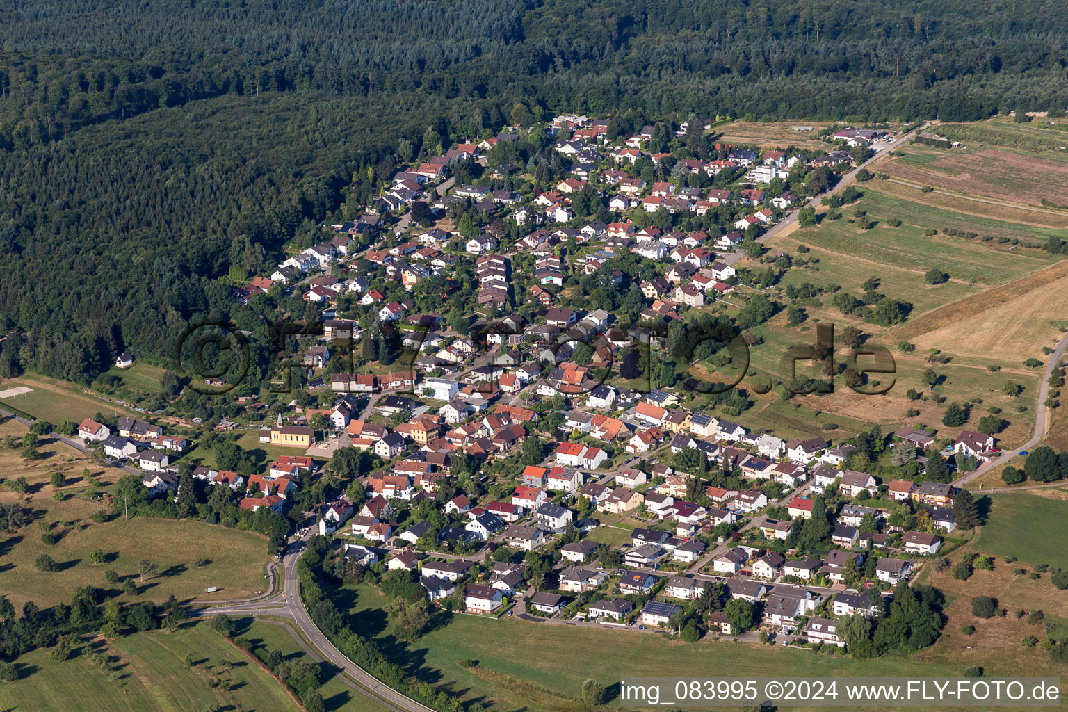 Village - view on the edge of agricultural fields and farmland in Schluttenbach in the state Baden-Wurttemberg, Germany