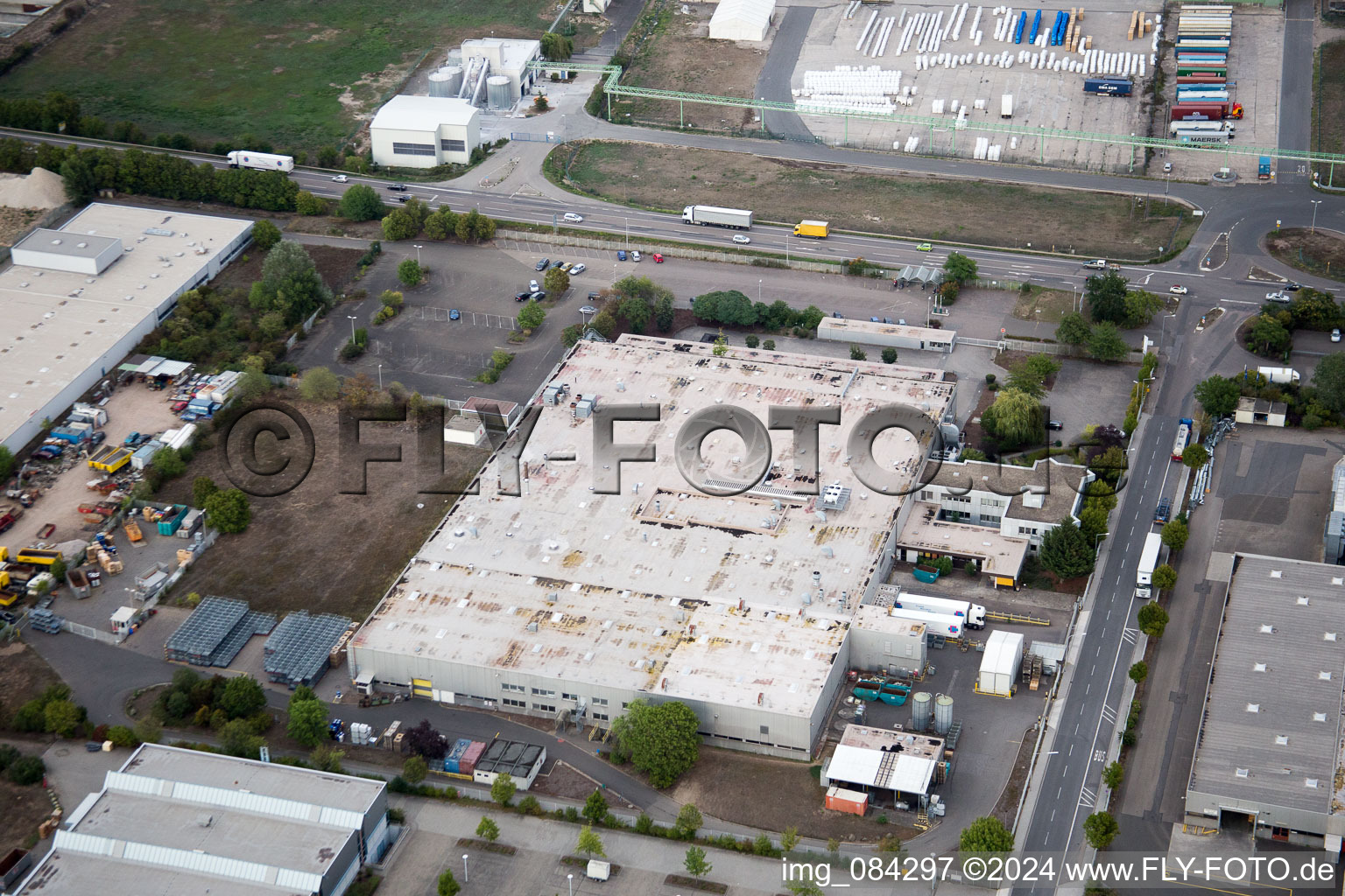 North industrial area on the Rhine in Worms in the state Rhineland-Palatinate, Germany from the plane