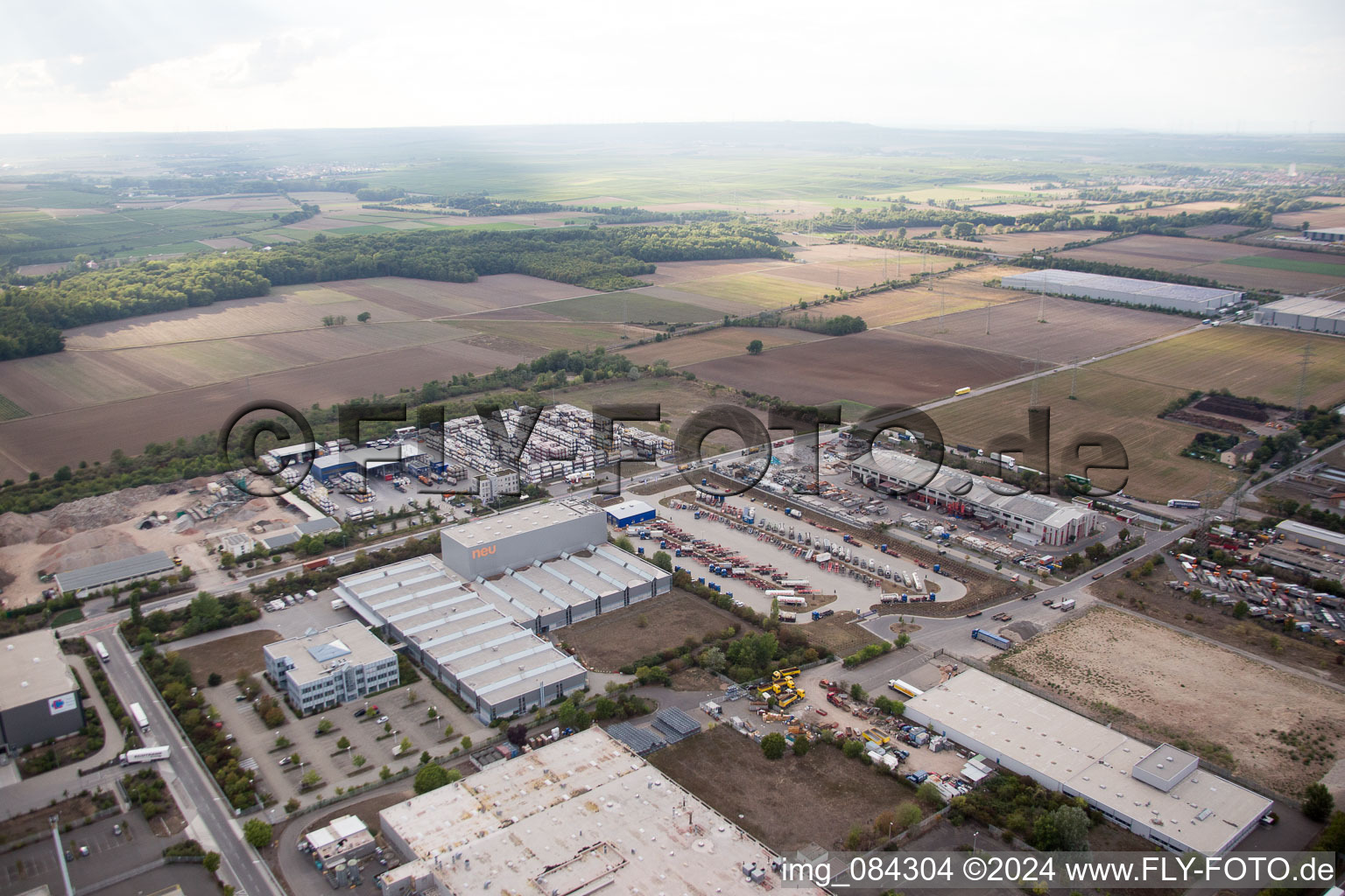 Industrial area Im Langgewan, forwarding company Kube & Kubenz in Worms in the state Rhineland-Palatinate, Germany viewn from the air