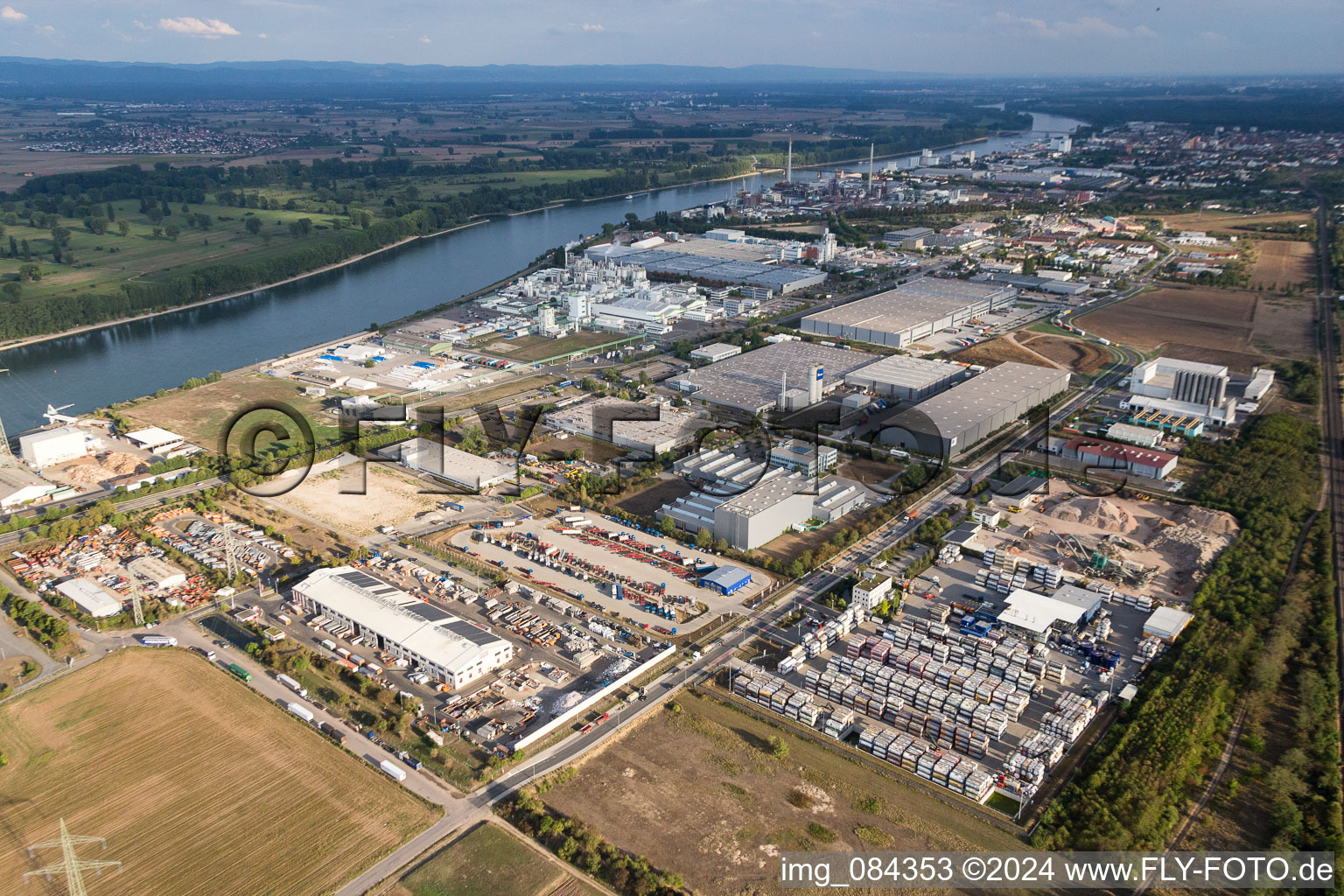 Technical facilities in the industrial area Im Langgewann on the river bank of the Rhine in Worms in the state Rhineland-Palatinate, Germany