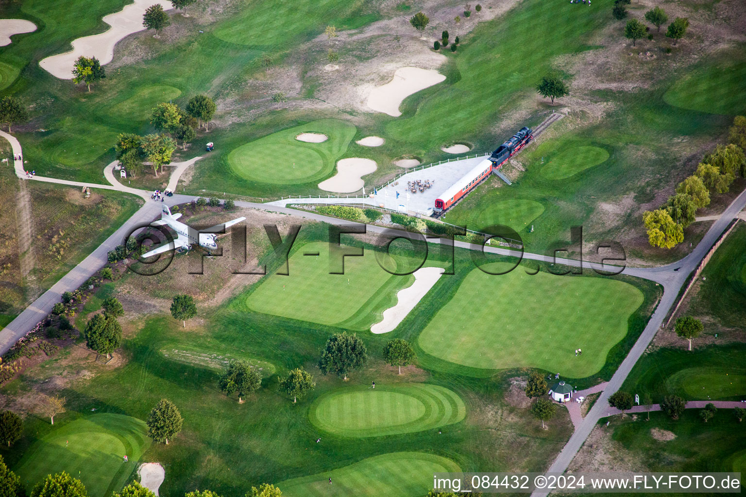 Grounds of the Golf course at Golfpark Biblis-Wattenheim with plane and steam train exhibits in the district Wattenheim in Biblis in the state Hesse