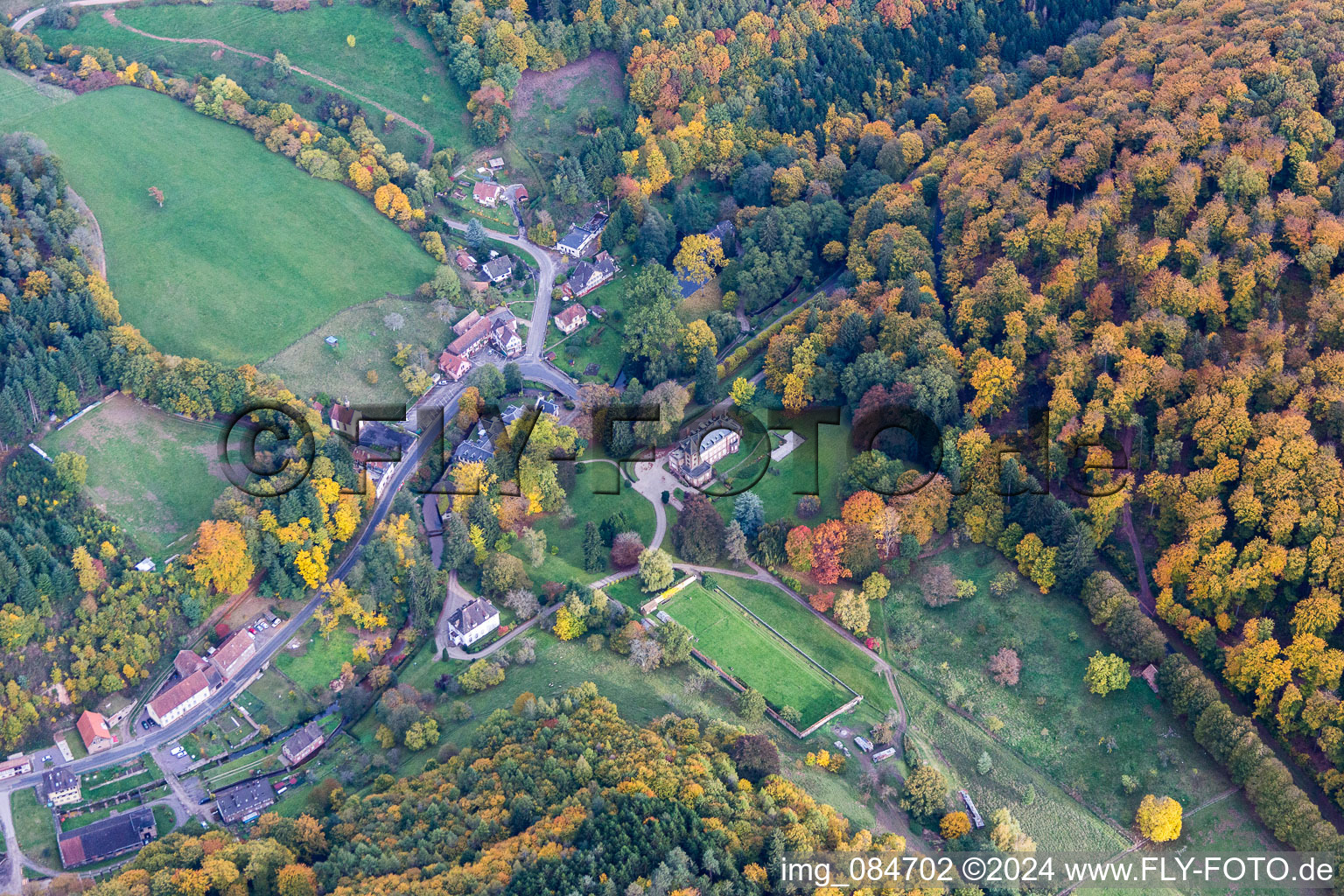 Aerial photograpy of Complex of the hotel building Domaine Jaegerthal in a green valley in the district Jaegerthal in Windstein in Grand Est, France