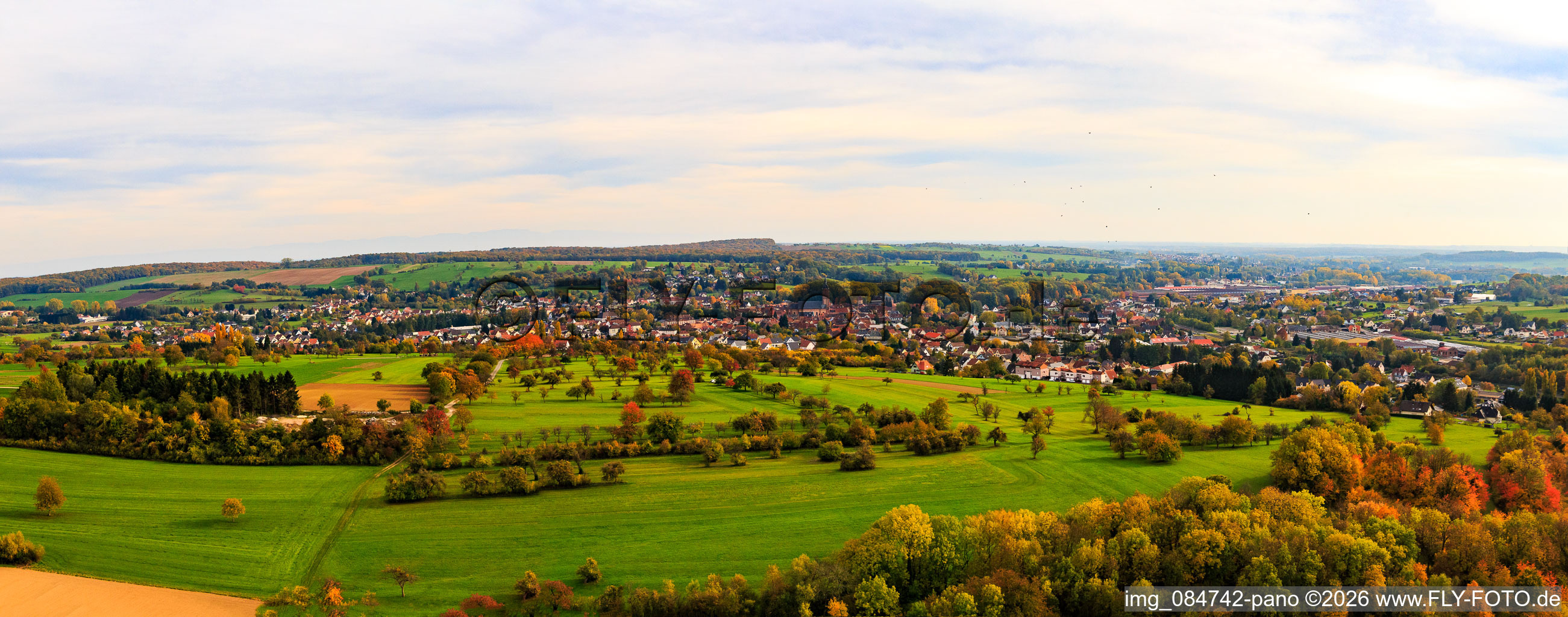 Panoramas behind orchards from the west in Niederbronn-les-Bains in the state Bas-Rhin, France