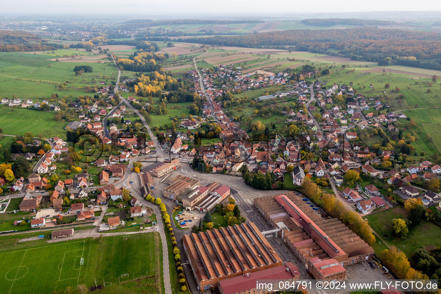 Village - view on the edge of agricultural fields and farmland in Zinswiller in Grand Est, France