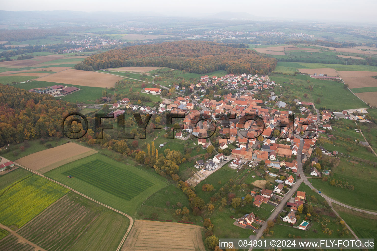 Village - view on the edge of agricultural fields and farmland in Engwiller in Grand Est, France