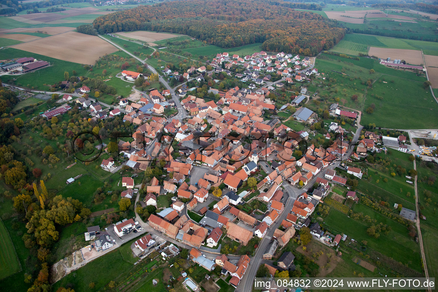 Aerial view of Village - view on the edge of agricultural fields and farmland in Engwiller in Grand Est, France
