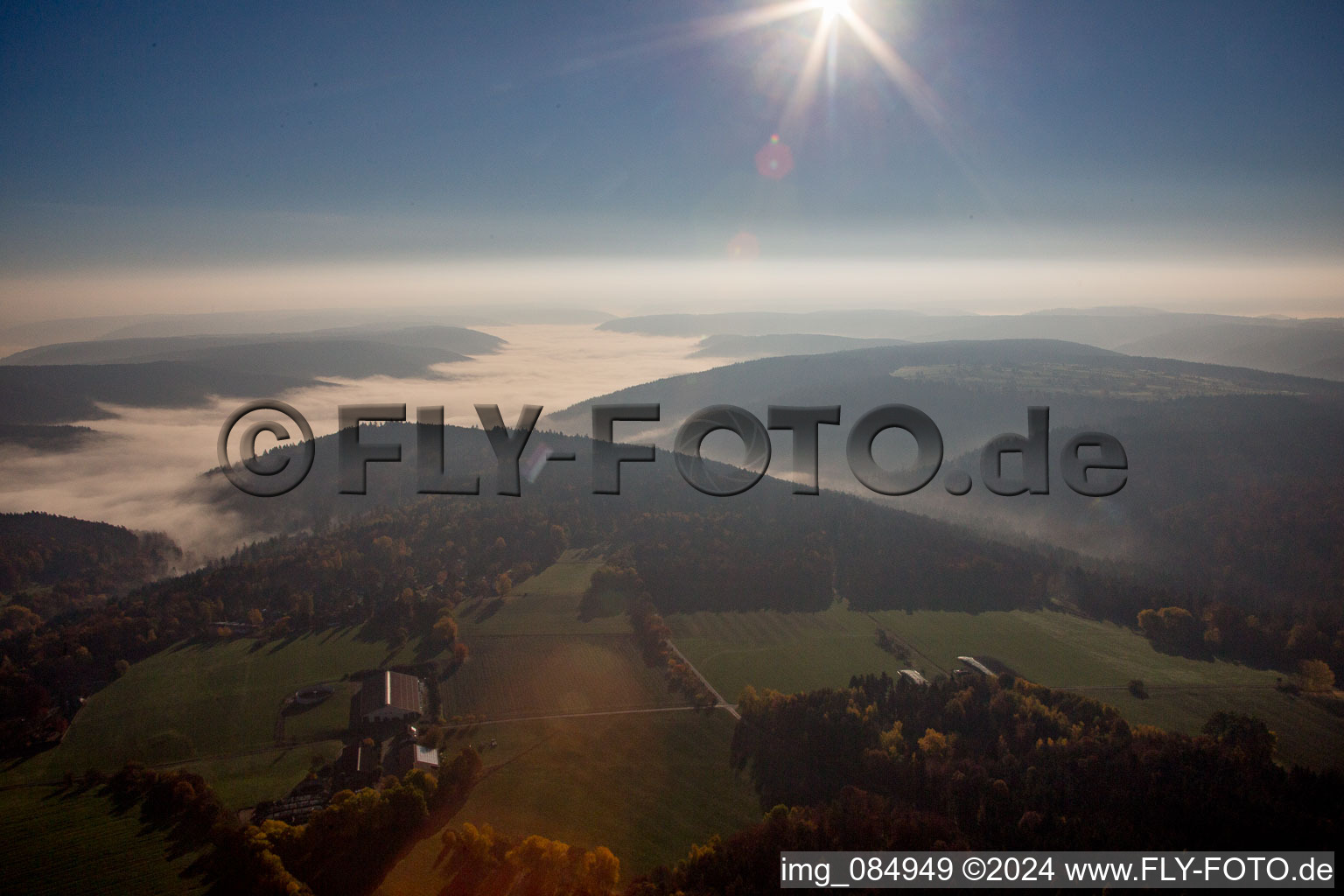 Morning mist Forest and mountain scenery of the Odenwald in Weilbach in the state Bavaria