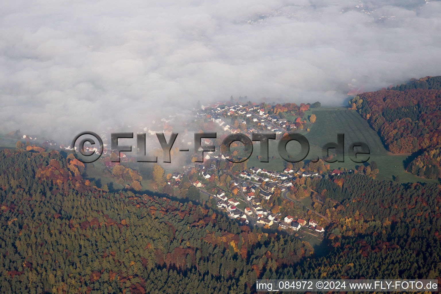 Aerial view of In the morning mist in Erbach in the state Hesse, Germany