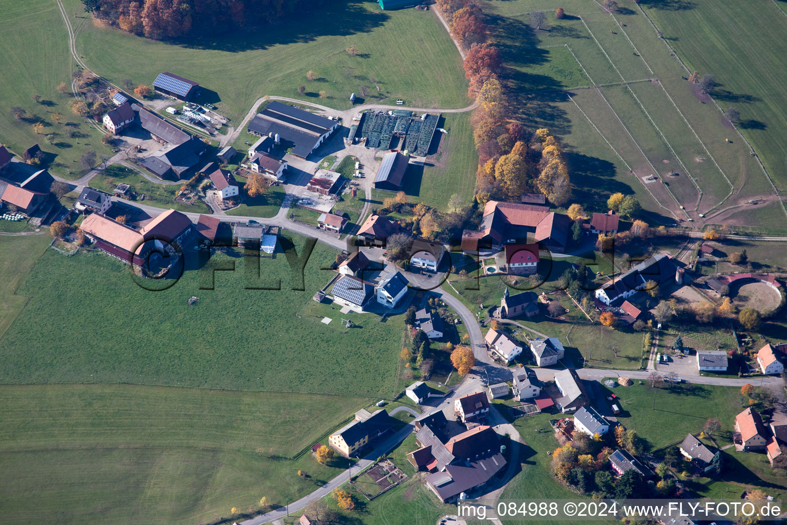 Aerial view of Village - view on the edge of agricultural fields and farmland in Breitenbuch in the state Bavaria