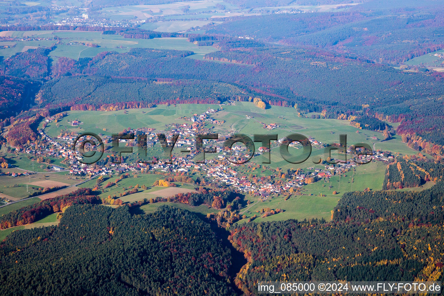 Aerial photograpy of Village - view on the edge of agricultural fields and farmland in Wuerzberg in the state Hesse, Germany