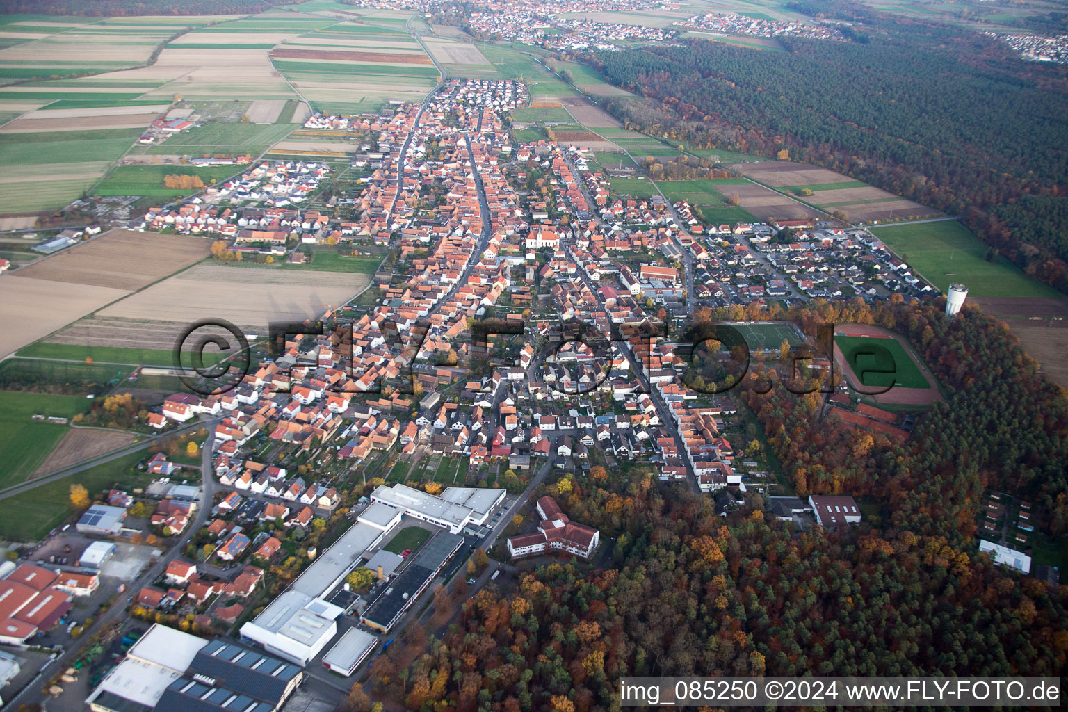 Village - view on the edge of agricultural fields and farmland in Hatzenbuehl in the state Rhineland-Palatinate, Germany