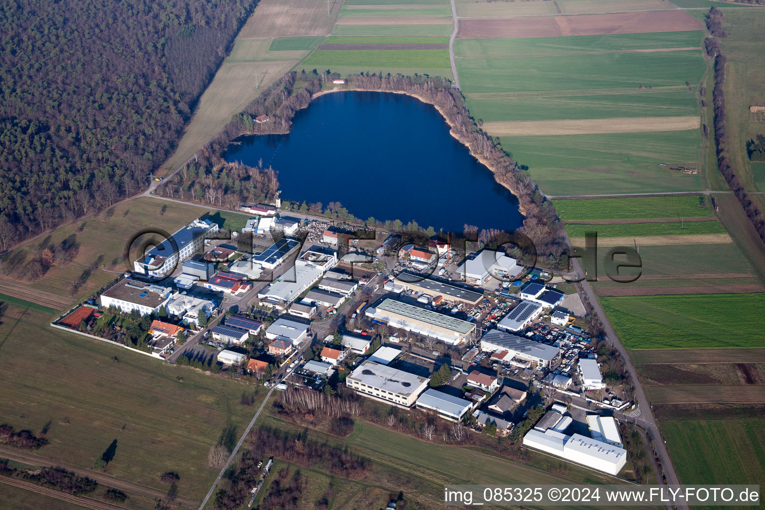 Aerial view of Industrial road at the quarry lake Spöck in the district Spöck in Stutensee in the state Baden-Wuerttemberg, Germany