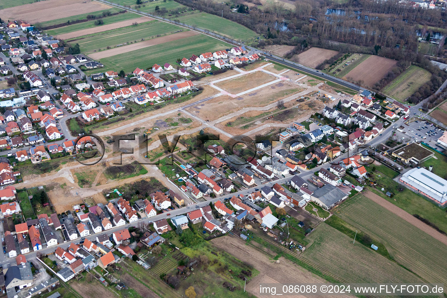 Construction sites for new construction residential area of detached housing estate Salierstrasse in the district Heiligenstein in Roemerberg in the state Rhineland-Palatinate, Germany