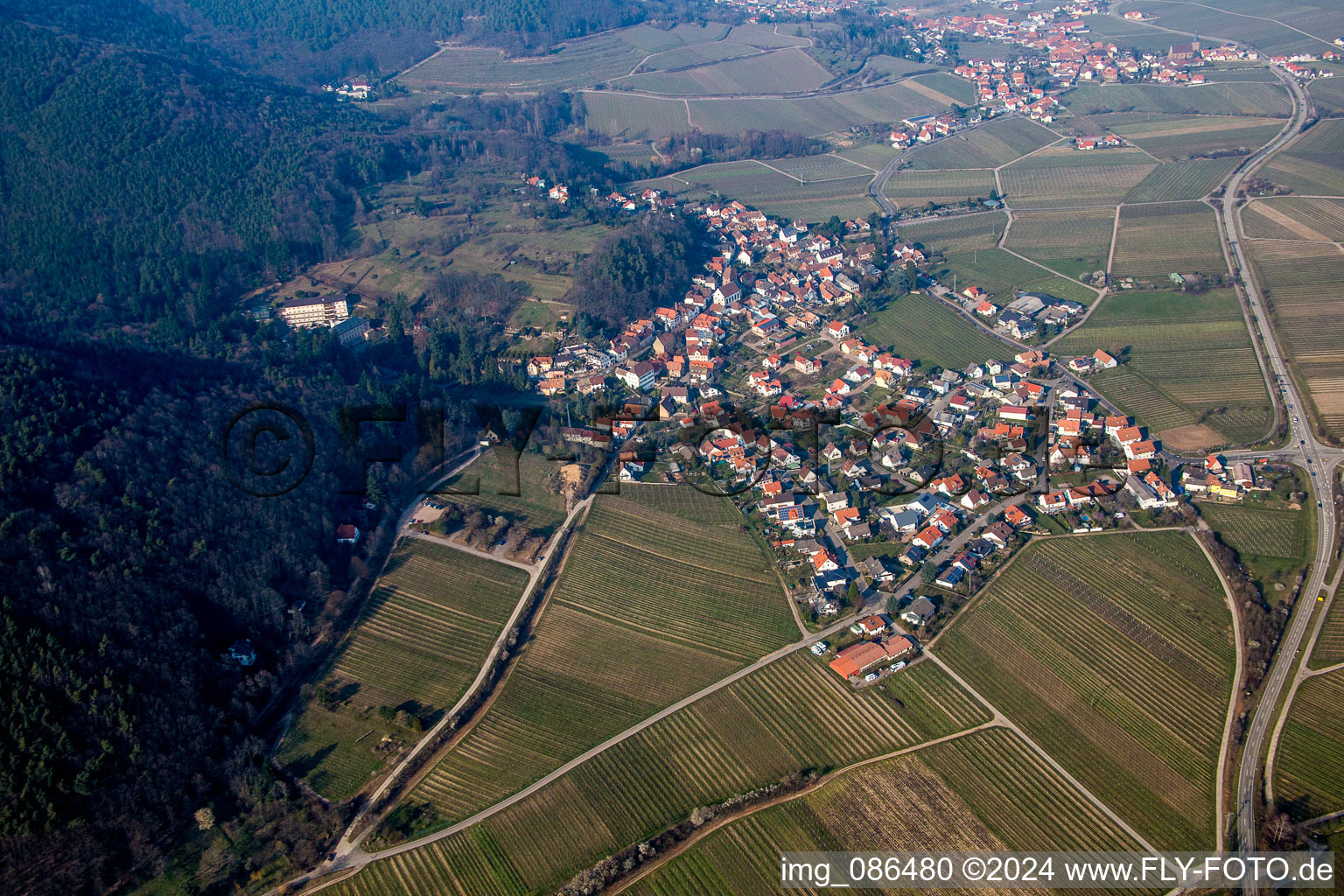 Village - view on the edge of agricultural fields and farmland in Gleisweiler in the state Rhineland-Palatinate, Germany