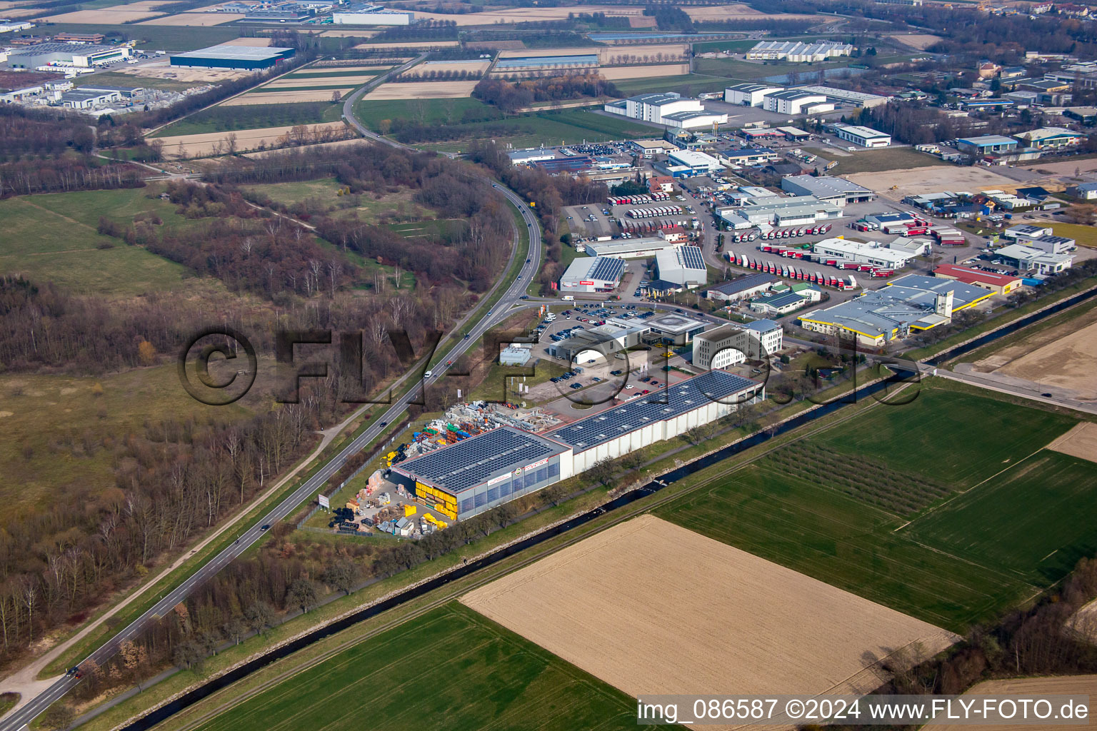 Aerial view of Wertheimer building materials on the Acher in the district Fautenbach in Achern in the state Baden-Wuerttemberg, Germany