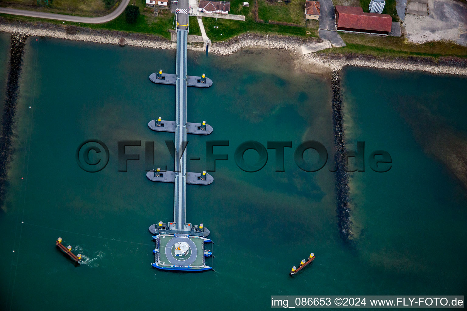 Aerial view of Rhine Ferry ship and dock between Seltz am Rhein in Alsace and Plittersdorf in Rastatt in the state Baden-Wurttemberg