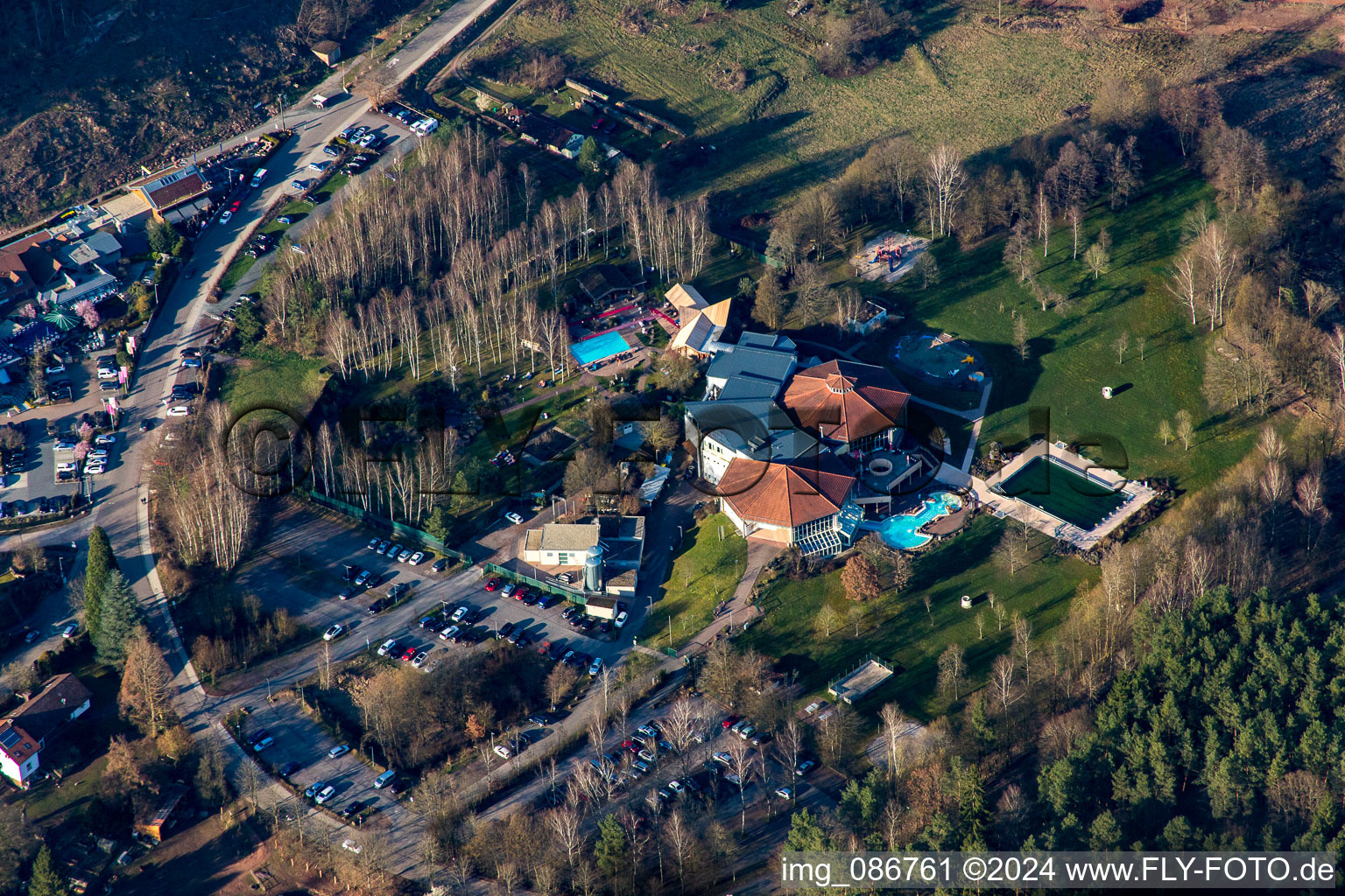 Spa and swimming pools at the swimming pool of the leisure facility Felsland Badeparadies in the district Buettelwoog in Dahn in the state Rhineland-Palatinate