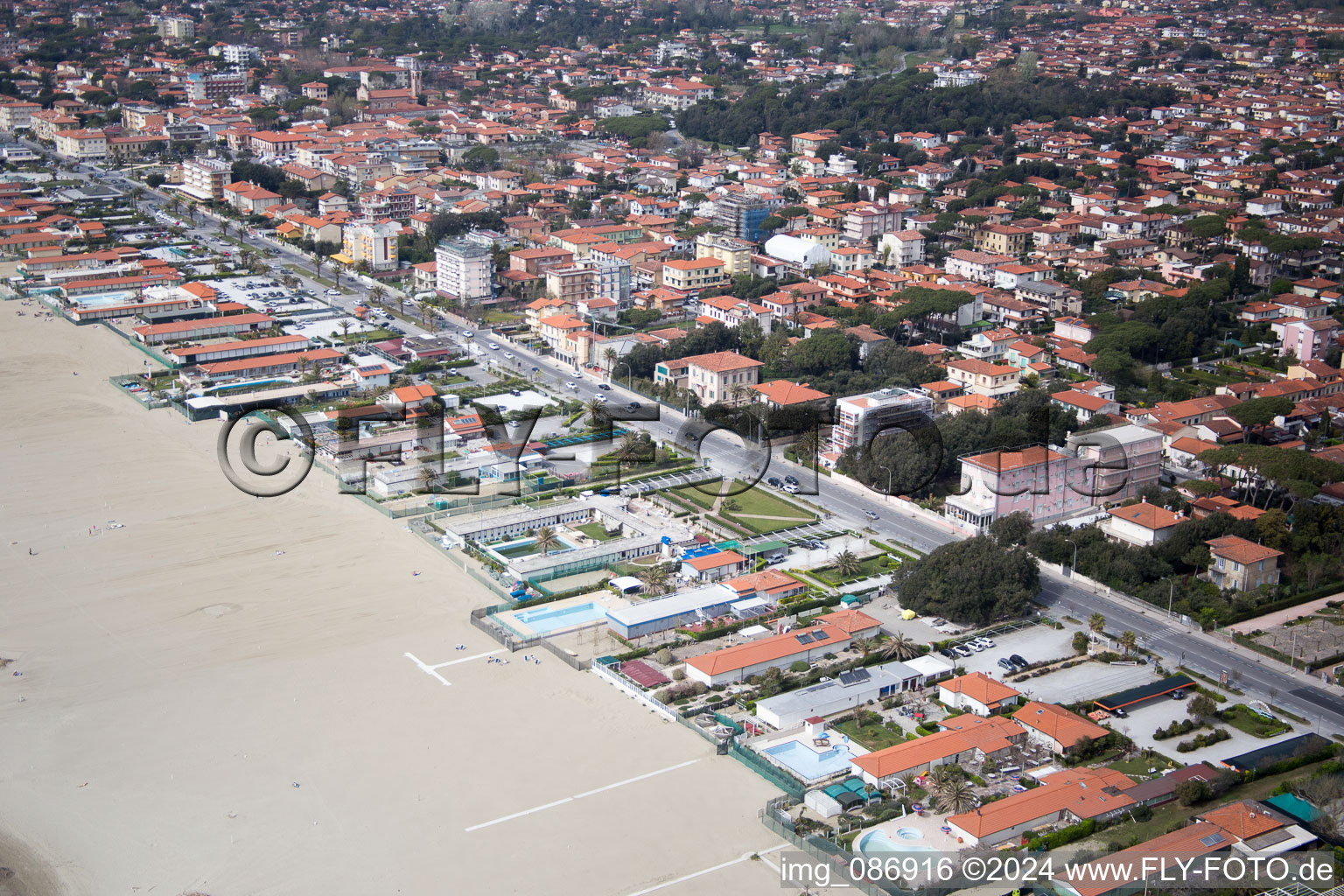 Aerial view of Coastline on the sandy beach of the Ligurian sea in Forte dei Marmi in Toskana, Italy