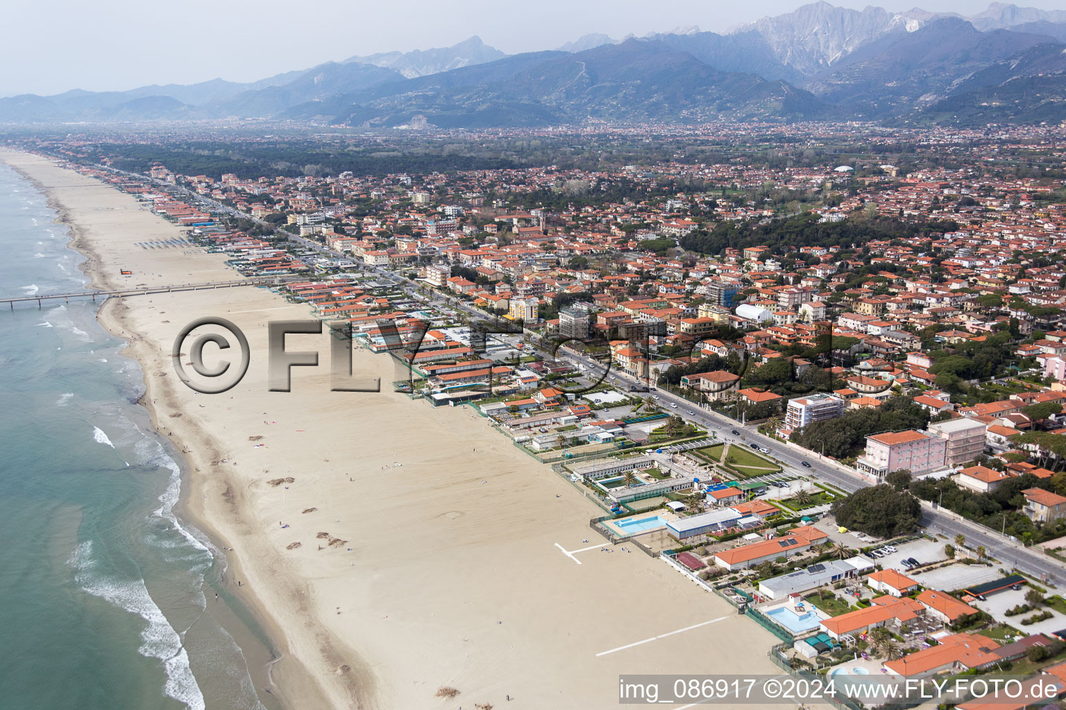 Aerial photograpy of Coastline on the sandy beach of the Ligurian sea in Forte dei Marmi in Toskana, Italy