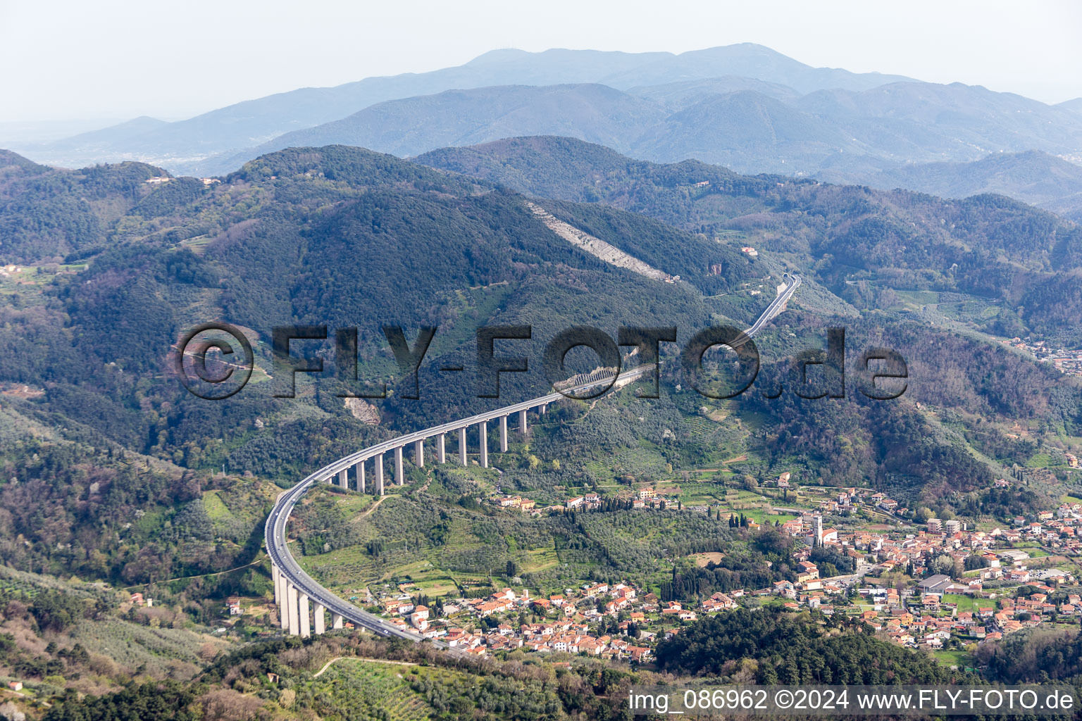 Routing and traffic lanes over the highway bridge in the motorway A 11 in Massarosa in Toskana, Italy