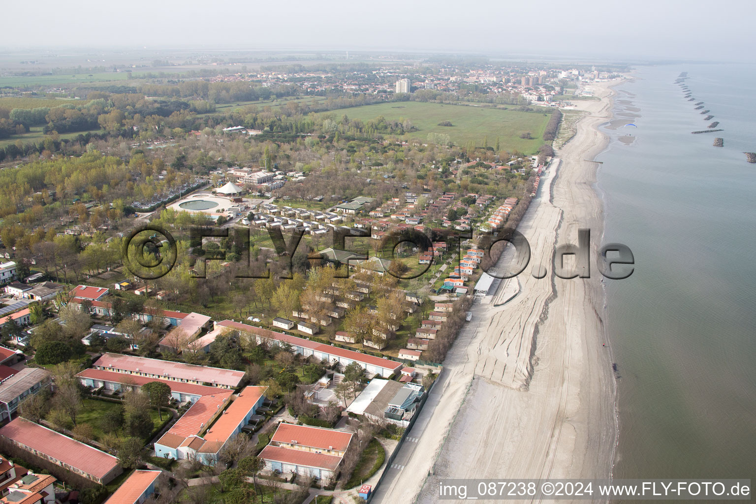 Aerial view of Camping Village Vigna sul Mar in the district Lido di Pomposa-Lido degli Scacchi in Comacchio in the state Ferrara, Italy