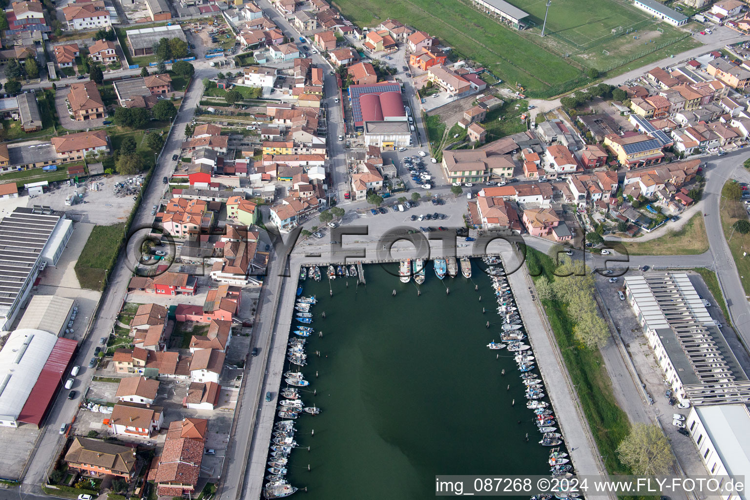Pleasure boat marina with docks and moorings on the shore area der Adria in Goro in Emilia-Romagna, Italy out of the air