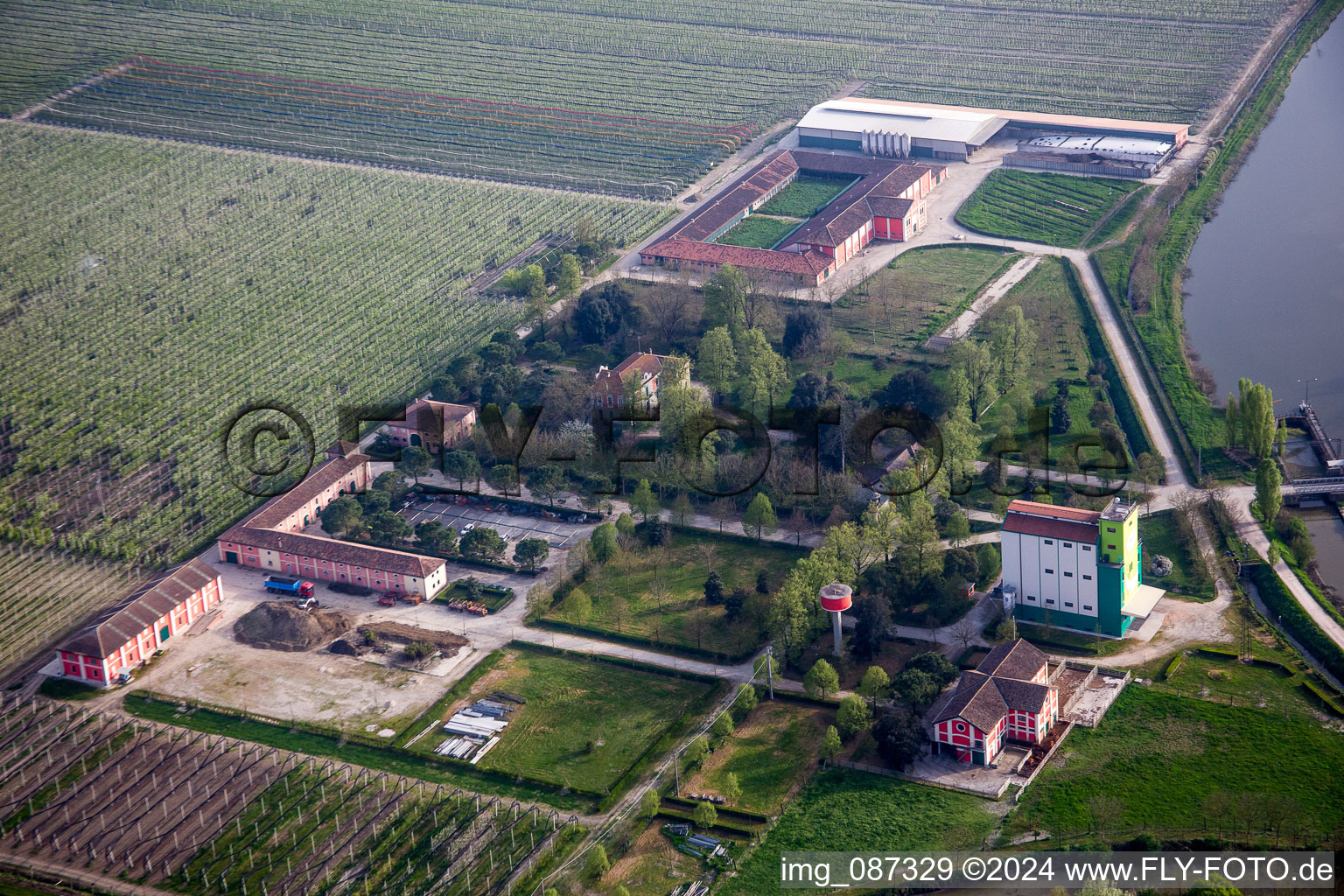 Farm on the edge of cultivated fields in Lodigiana in Emilia-Romagna, Italy