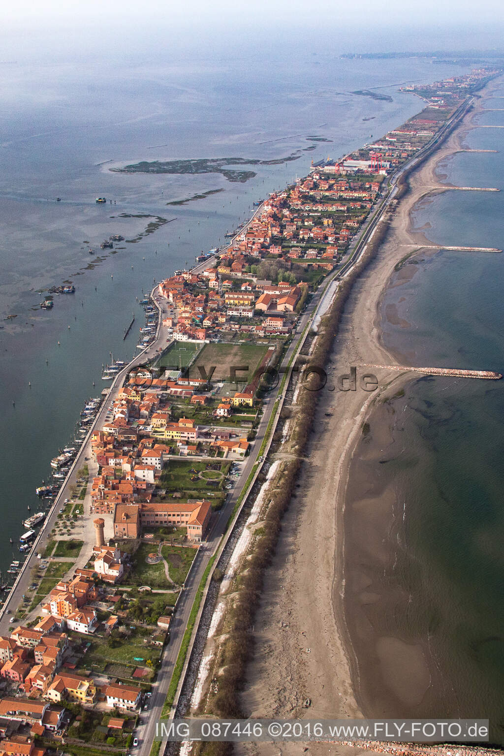 Settlement area in the district Pellestrina in Venedig in Venetien, Italy seen from a drone