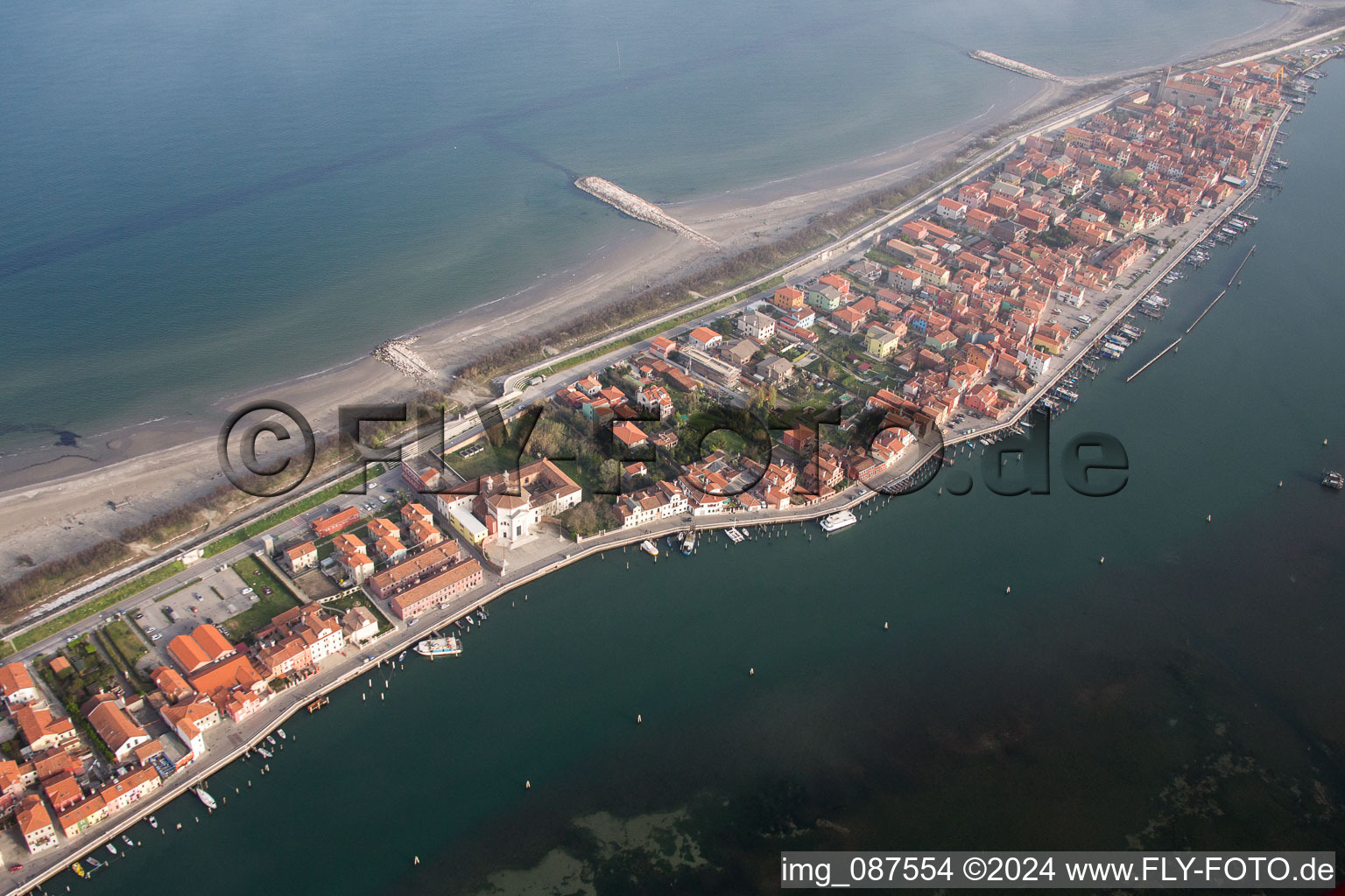 Townscape on the seacoast of Mediterranean Sea in San Vito in Veneto, Italy from above