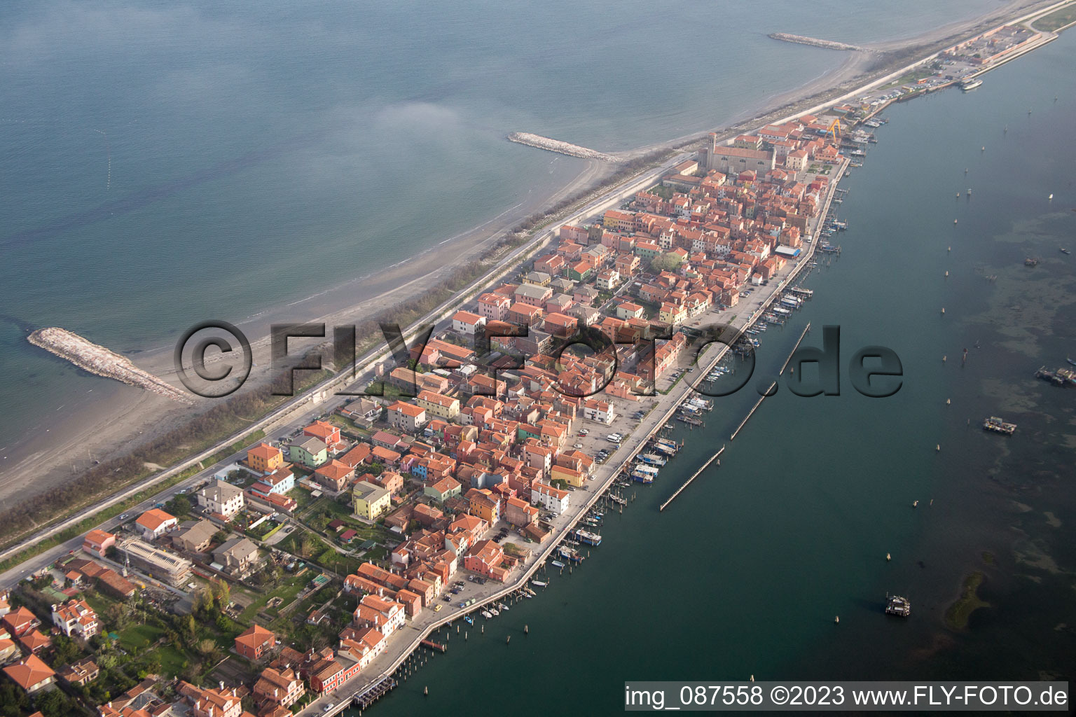 Townscape on the seacoast of Mediterranean Sea in San Vito in Veneto, Italy seen from above