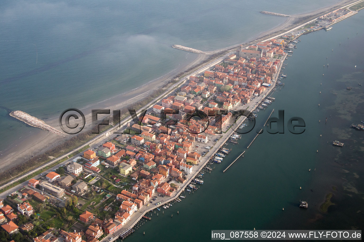 Townscape on the seacoast of Mediterranean Sea in San Vito in Veneto, Italy from above