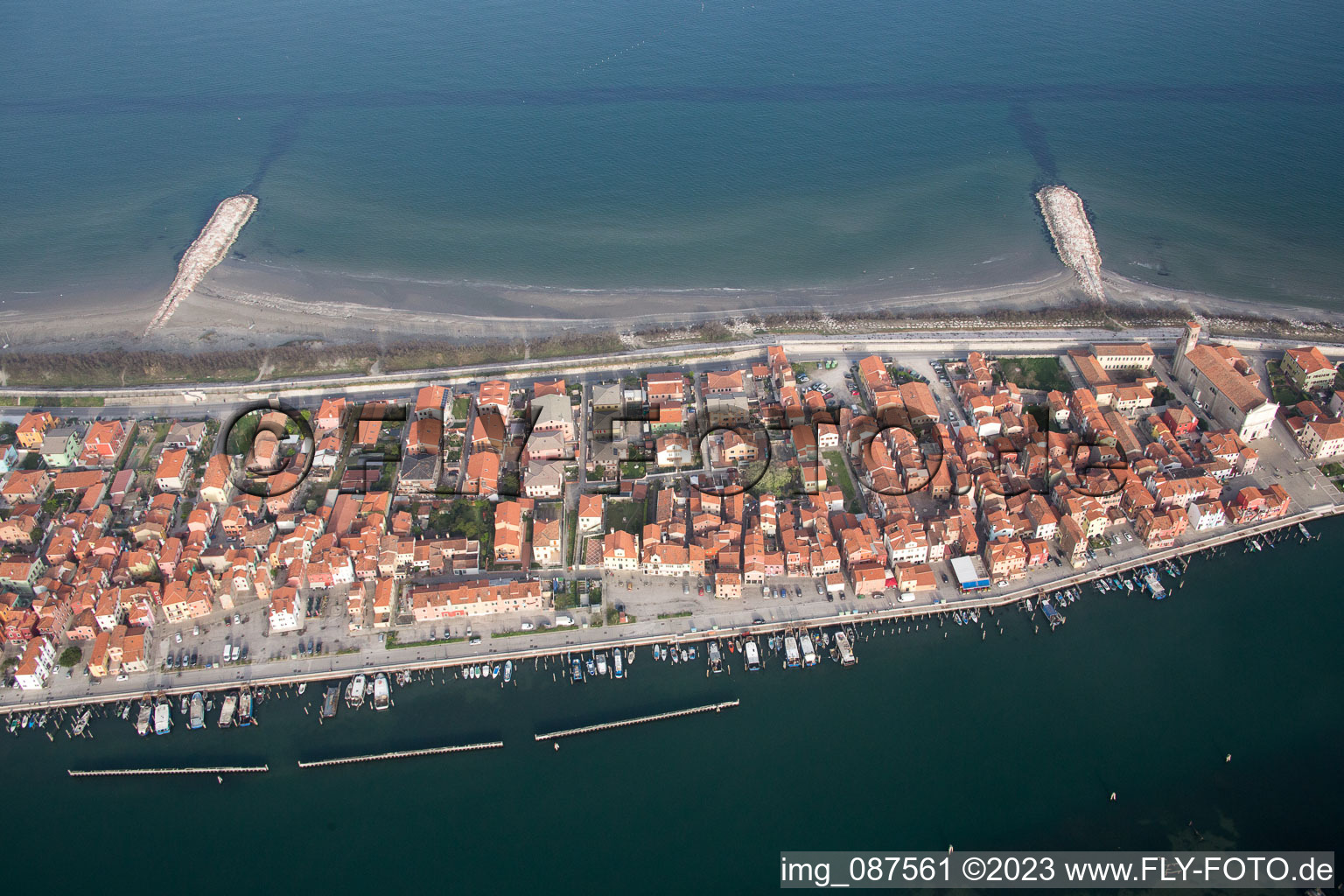 Townscape on the seacoast of Mediterranean Sea in San Vito in Veneto, Italy viewn from the air