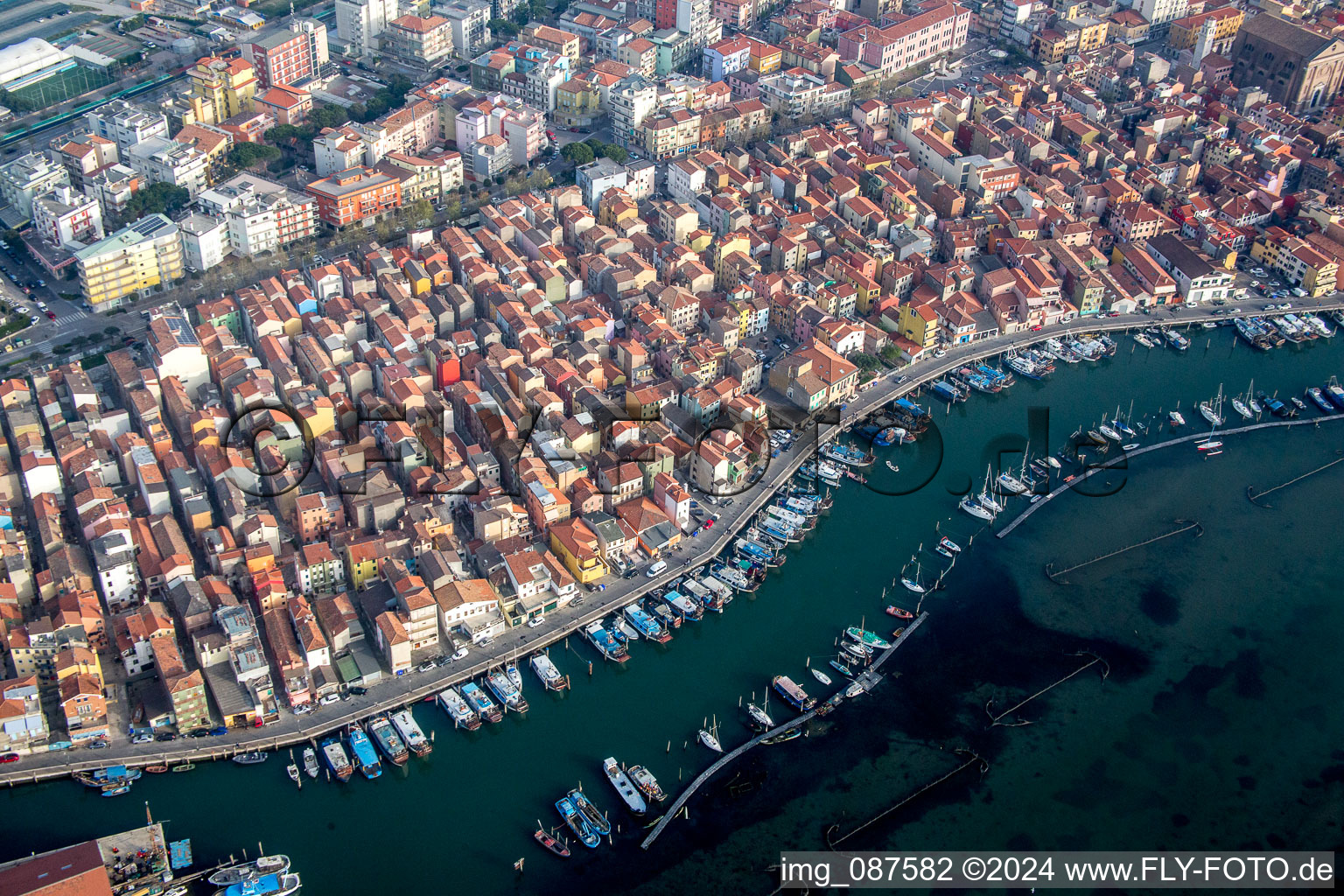Aerial view of Port facilities on the seashore of the Lagune von Venedig in the district Sottomarina in Chioggia in Veneto, Italy