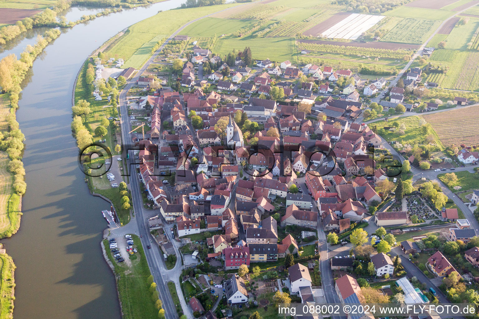 Aerial view of Village on the river bank areas of the Main river in the district Obereisenheim in Eisenheim in the state Bavaria, Germany