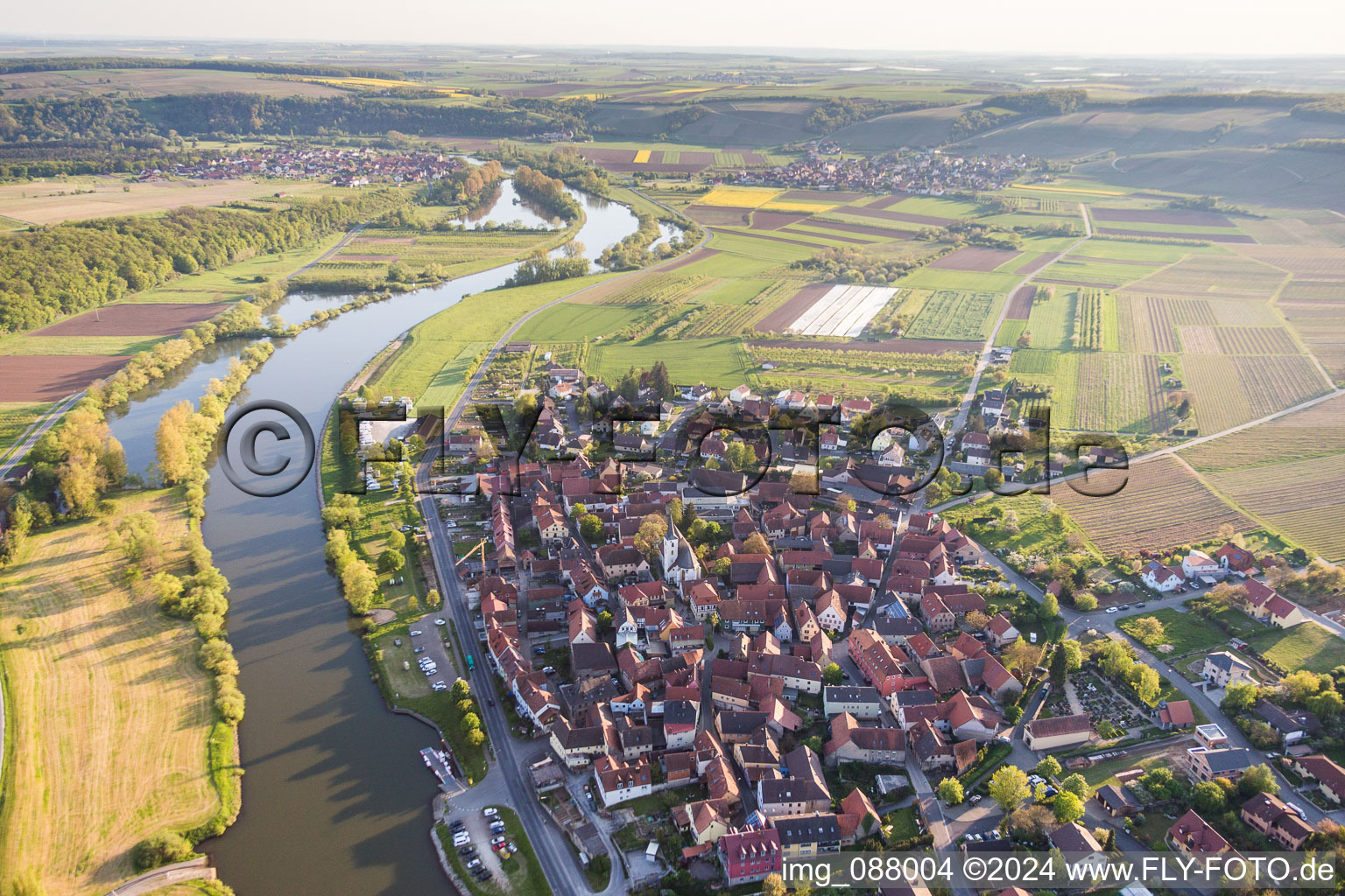 Aerial photograpy of Village on the river bank areas of the Main river in the district Obereisenheim in Eisenheim in the state Bavaria, Germany