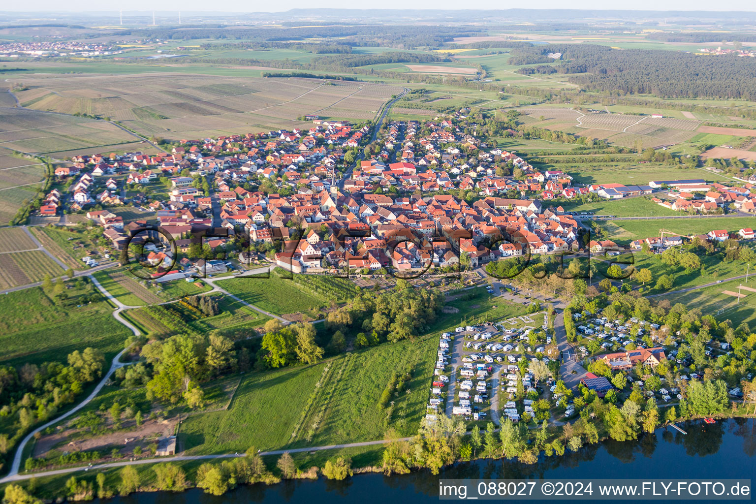 Aerial view of Village on the river bank areas of Main-Aue in Sommerach in the state Bavaria, Germany