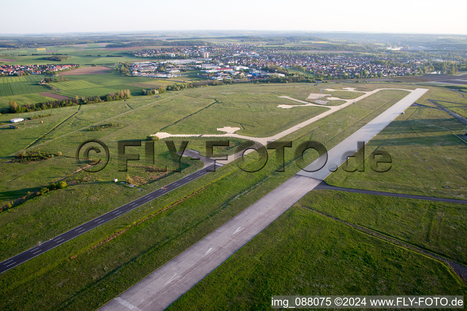 Aerial view of Runway with tarmac terrain of airfield LSC in the district Etwashausen in Kitzingen in the state Bavaria, Germany