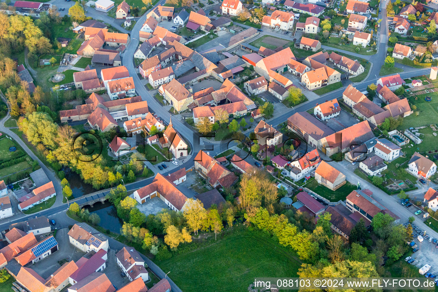 Aerial view of Church building in the village of in the district Laub in Prichsenstadt in the state Bavaria, Germany