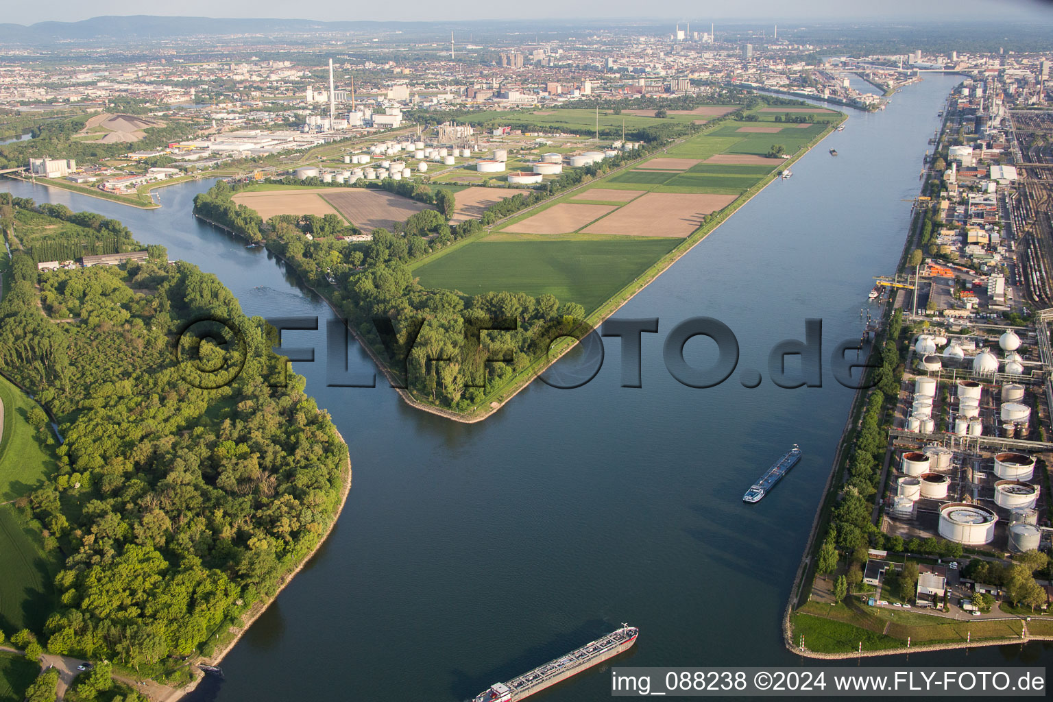 Aerial view of Island on the banks of the river course of Rhine river and of the old Rhine in the district Friesenheimer Insel in Mannheim in the state Baden-Wurttemberg, Germany