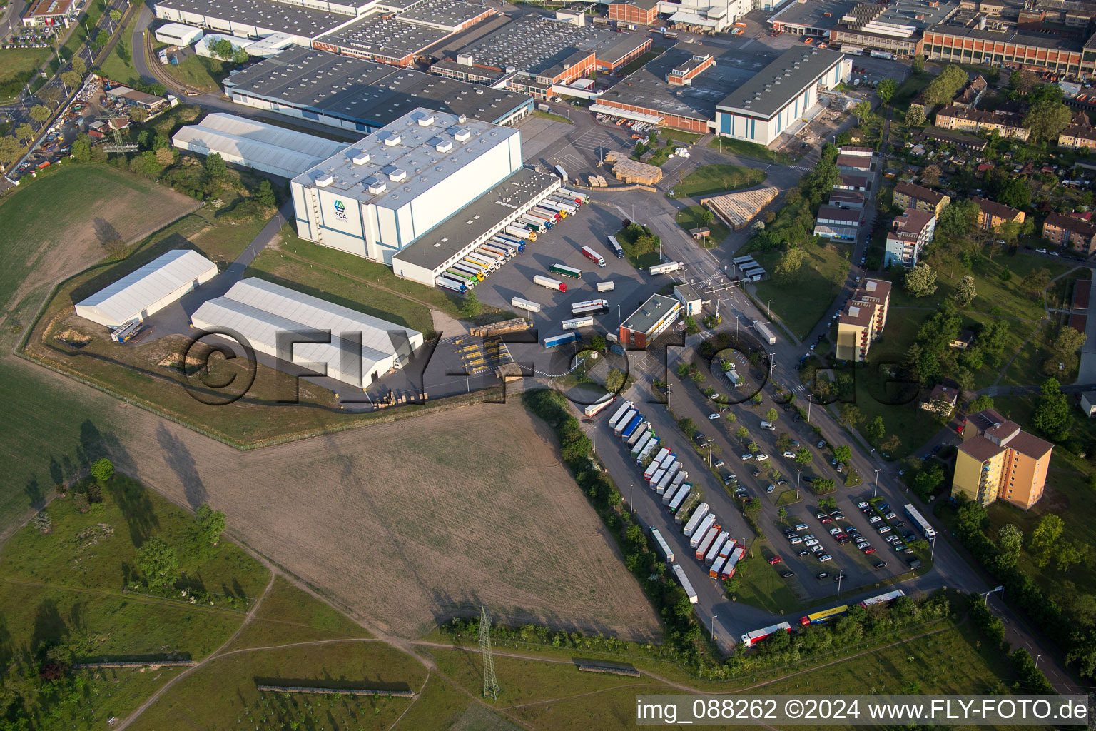 Aerial view of Lorry access to Building and production halls on the premises of SCA HYGIENE PRODUCTS GmbH in the district Waldhof in Mannheim in the state Baden-Wurttemberg, Germany