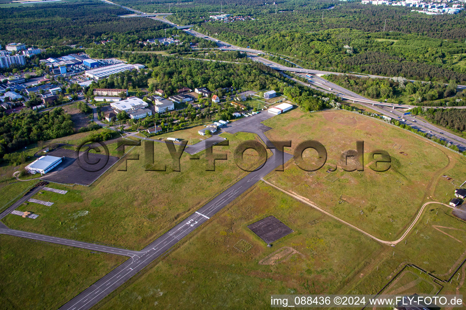 Runway with tarmac terrain of airfield August-Euler-Flugplatz in Griesheim in the state Hesse, Germany