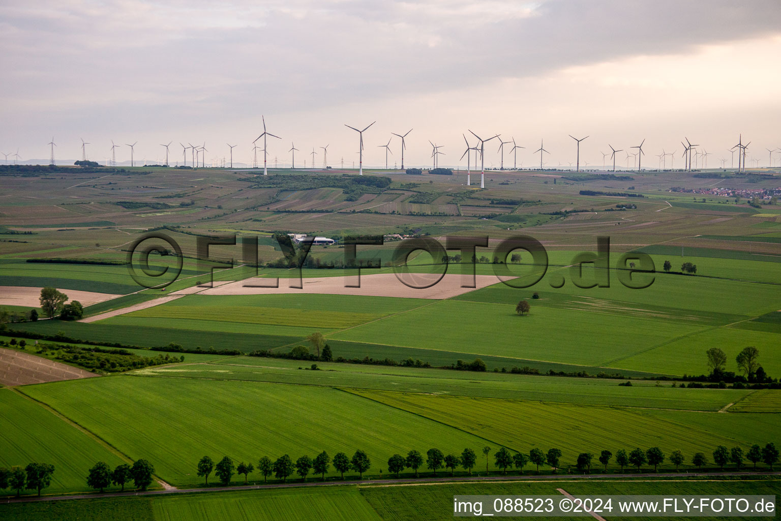 Wind turbine windmills on a hill in Gau-Odernheim in the state Rhineland-Palatinate