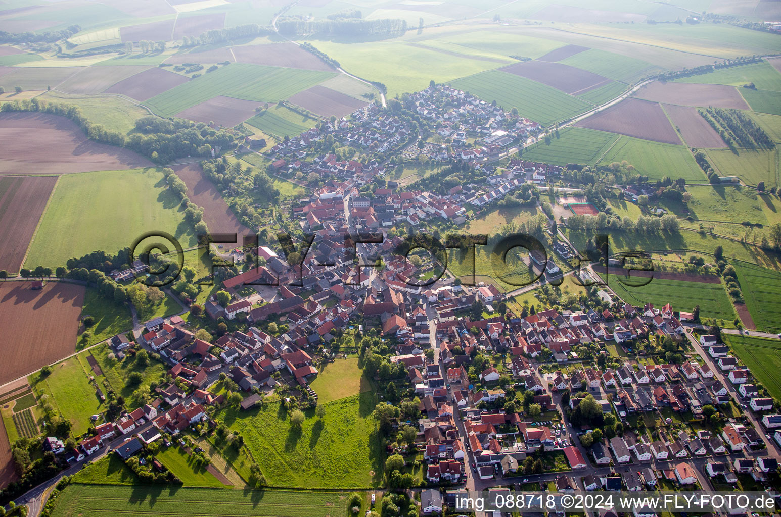 Village - view on the edge of agricultural fields and farmland in the district Habitzheim in Otzberg in the state Hesse, Germany