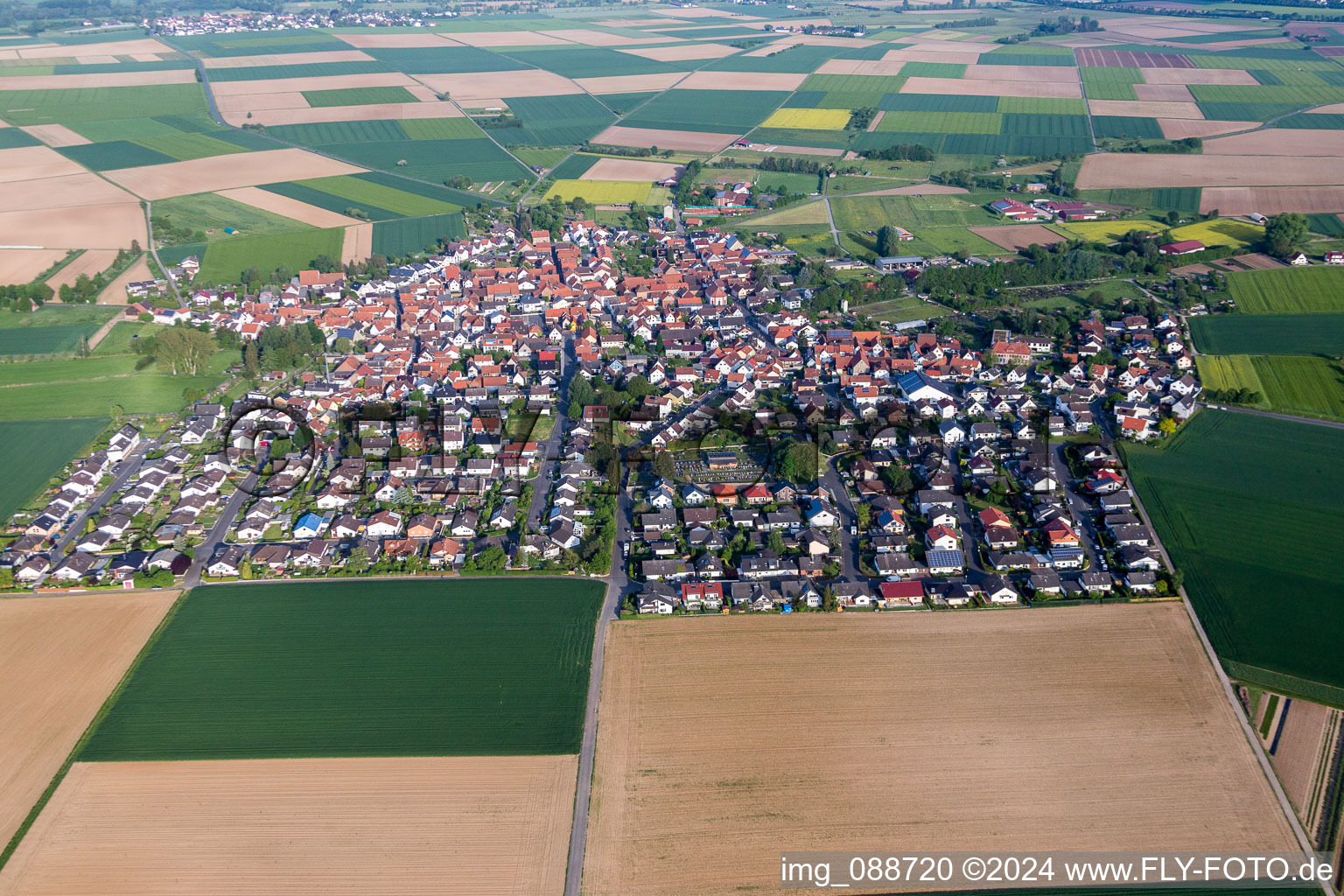 Village - view on the edge of agricultural fields and farmland in Gross-Umstadt in the state Hesse, Germany