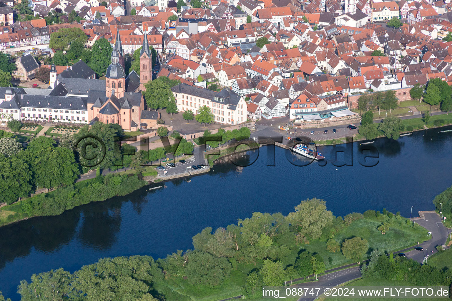 Ride a ferry ship over the main river "Stadt Seligenstadt" in Seligenstadt in the state Hesse, Germany